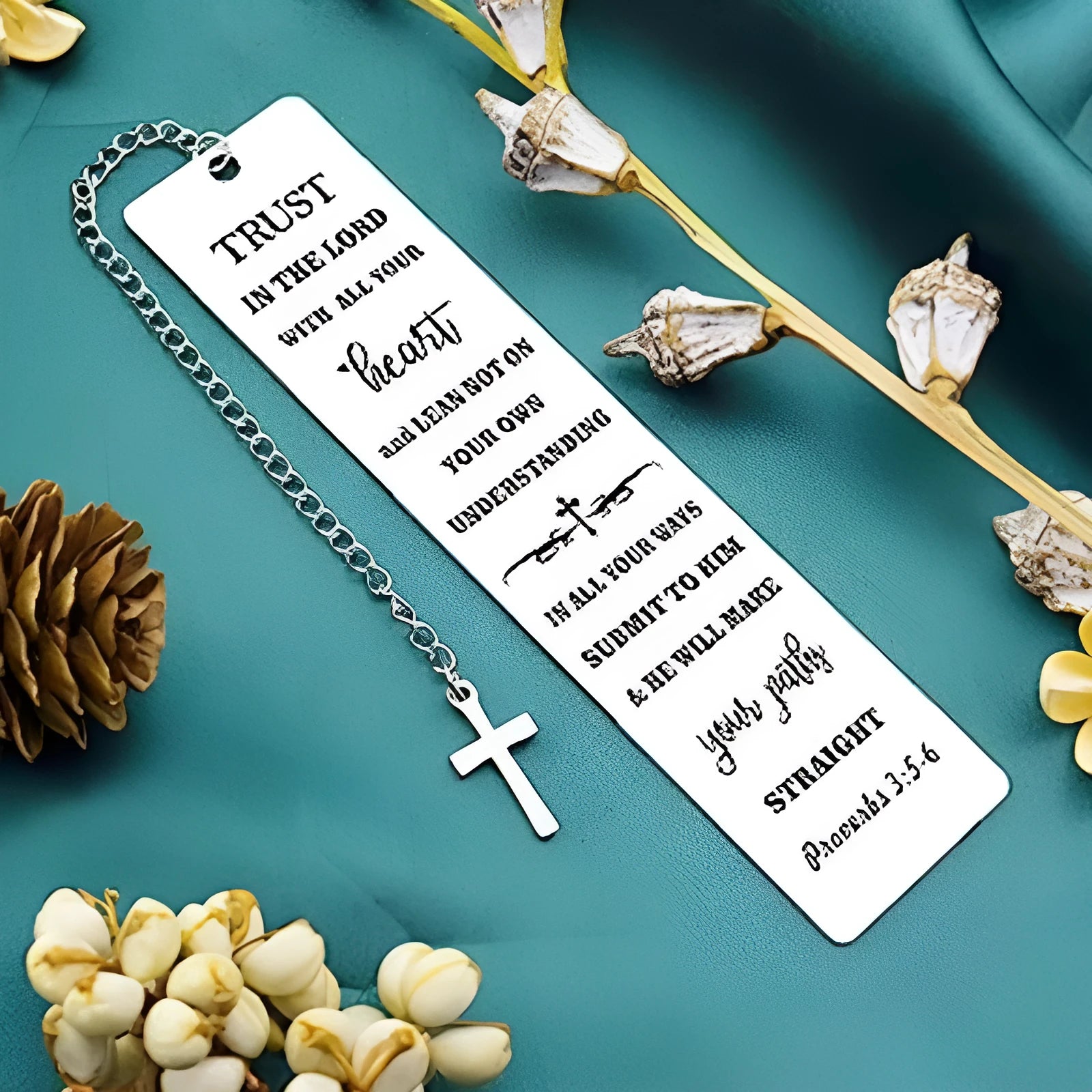 Stainless steel European style bookmark in CF-S5170 steel colour on an open book.