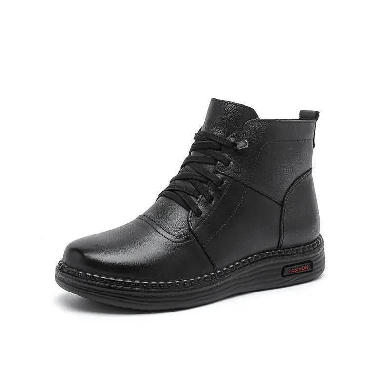 Mother cowhide leather ankle boots with wool lining, platform heel, and side zipper in black