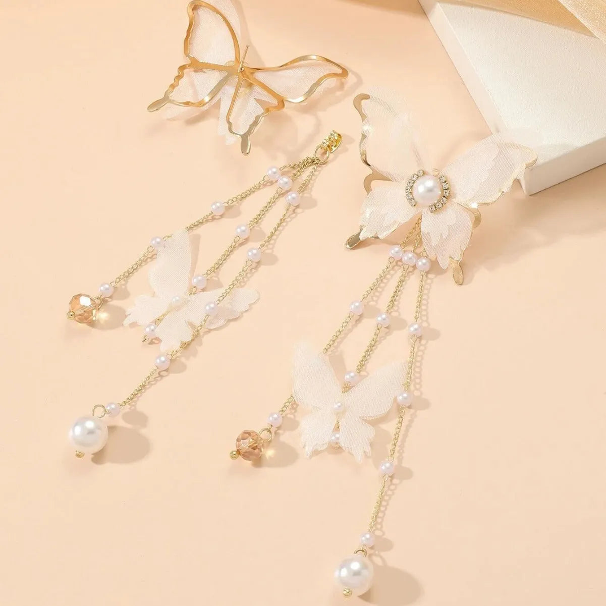 White butterfly earrings with tassel lace pearl rhinestone design on copper alloy