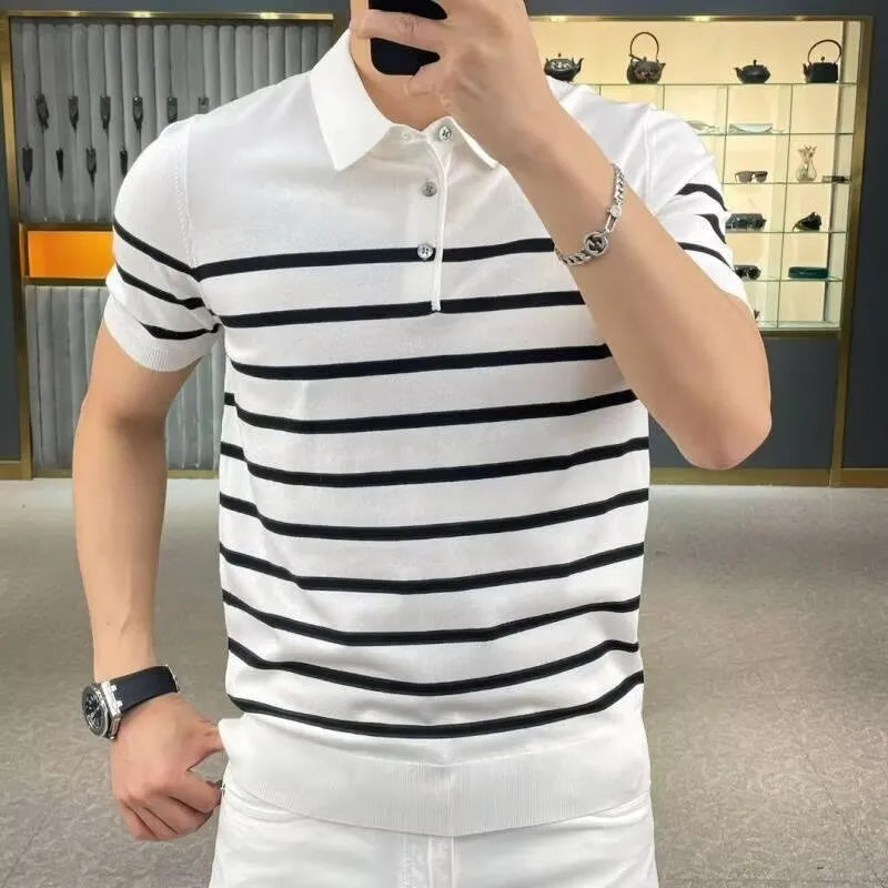 Man wearing a black and white striped knitted T-shirt with a lapel collar, casual style.