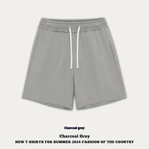 Children's loose-fit denim shorts in charcoal grey on a hanger