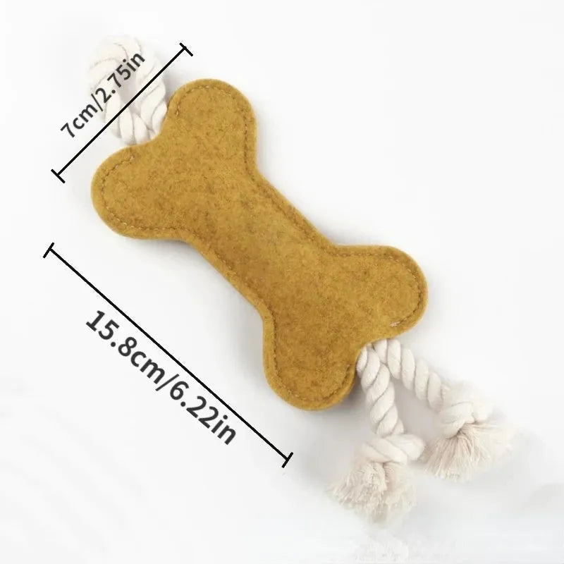 Bone-shaped dog chew toy with felt exterior showing rope knot texture inside, 16cm long in blue colour