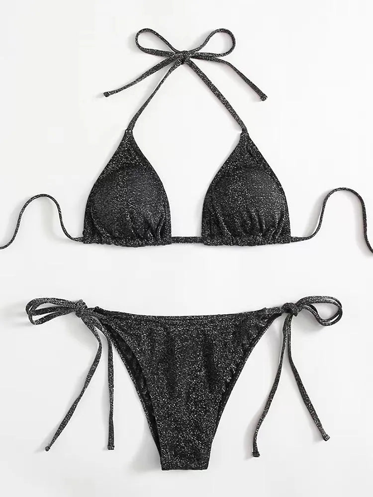 Women's bandage style bikini swimsuit with halter neck top and briefs in polyester fabric