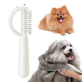 Dinosaur-shaped cat brush with stainless steel pins for self-cleaning pet grooming