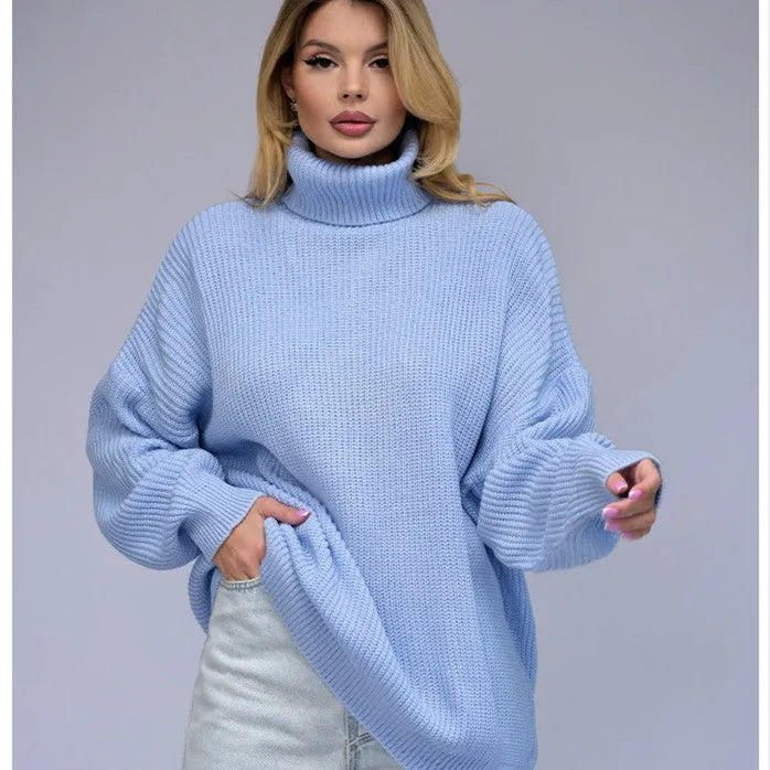 Women's sky blue loose high neck pullover sweater made from thick imitation cashmere fabric.