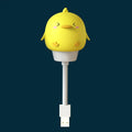 Cartoon animal USB night light with adjustable brightness on bedside table
