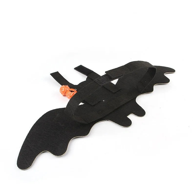 Black felt batwing Halloween costume for a cat, shown in pumpkin bat design