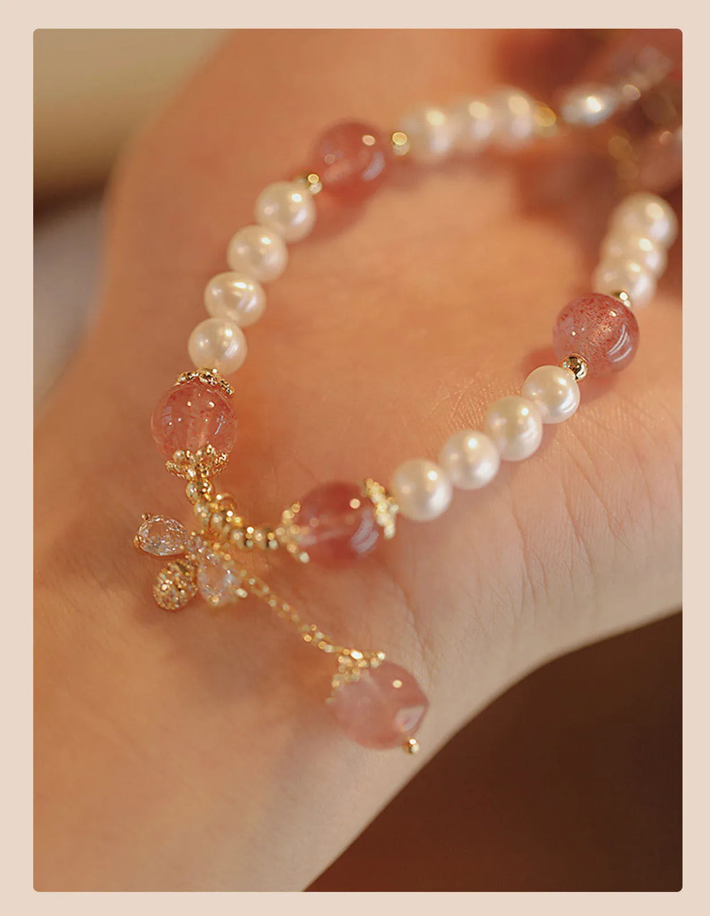Strawberry quartz crystal bracelet with stringed pearls and bow charm in INS style