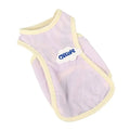 Grass green polyester cat vest for summer wear in size medium on grey background