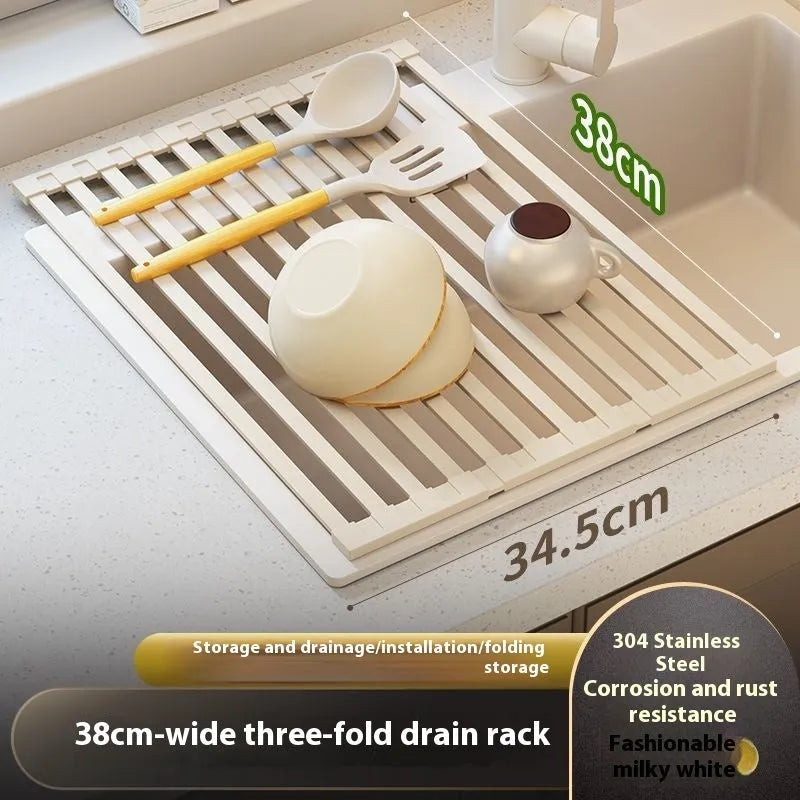 Milky white foldable stainless steel kitchen draining rack shown in a sink.