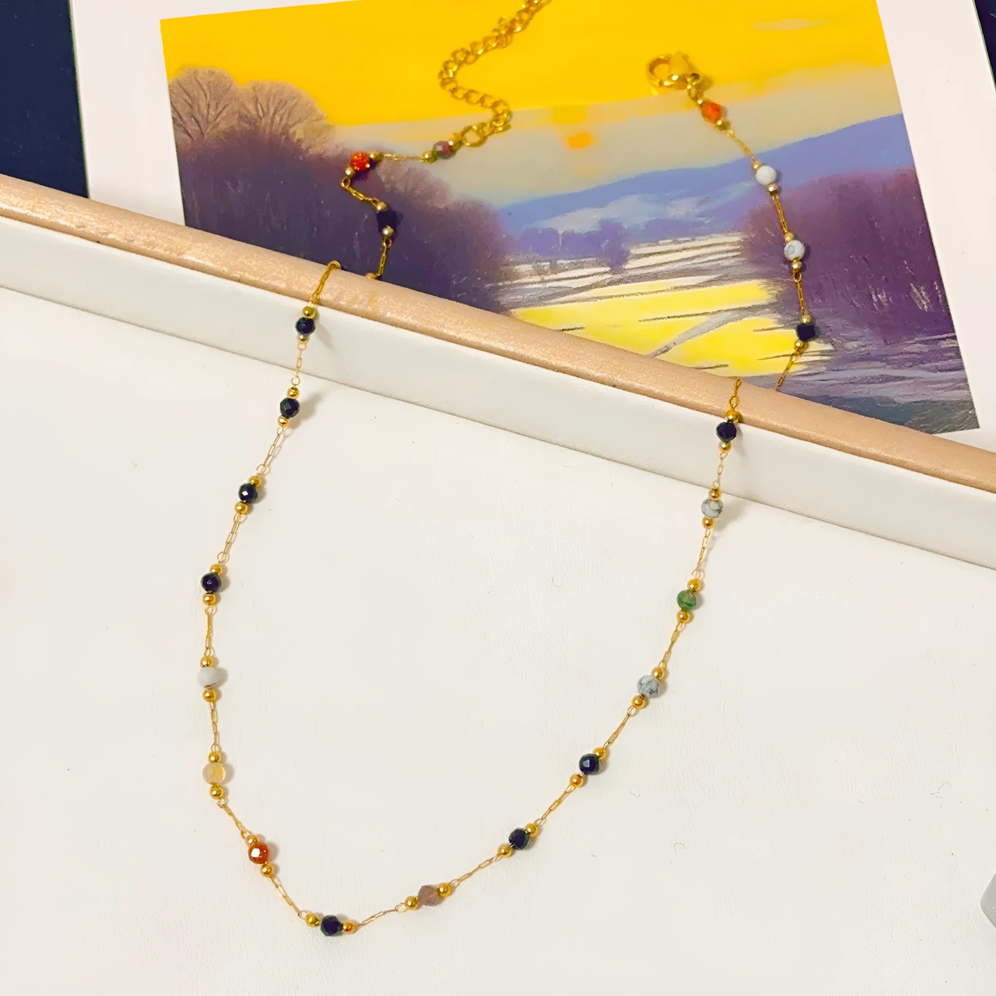 Women's titanium steel necklace with natural stone pendant in gold electroplated finish