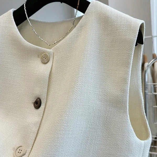 Women's French style bandage vest in milky white polyester with round neck and sleeveless design
