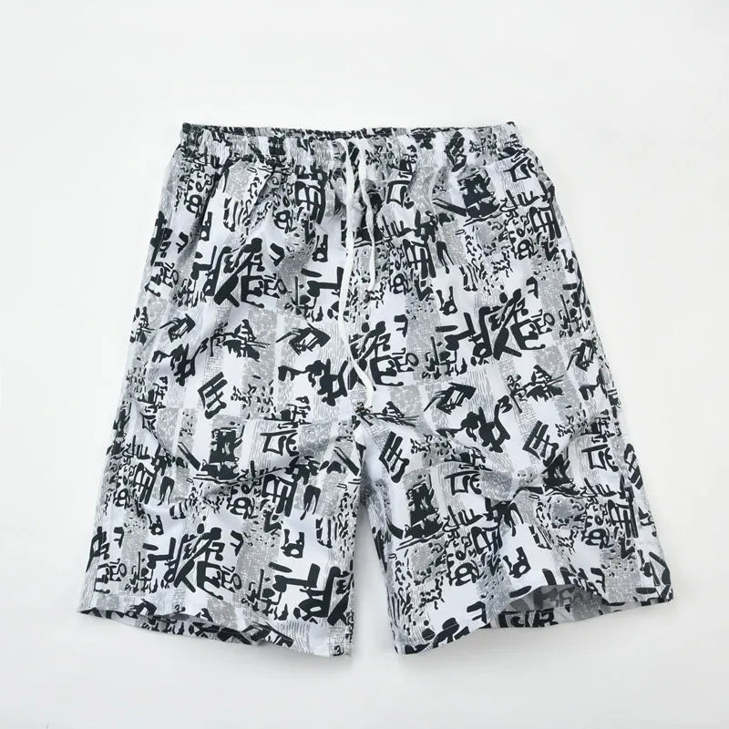 Men's floral print five-point swimming trunks in polyester, showing one of 24 available colour patterns.
