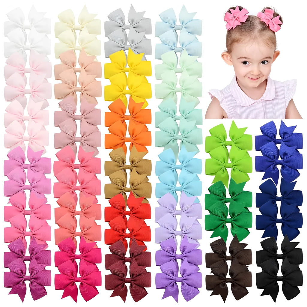 Assortment of multicoloured 3 inch grosgrain ribbon pinwheel hair bows with alligator clips for toddlers.