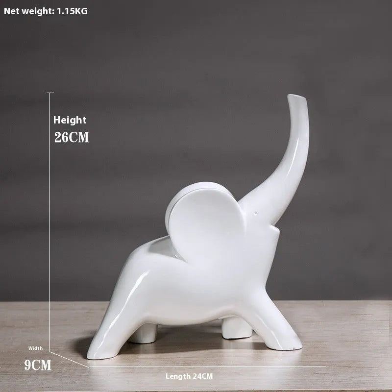 Modern resin elephant ornament in rose gold or white colour, available in large and small sizes.