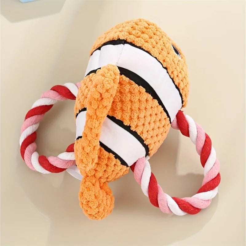 Turtle-shaped dog toy with knotted rope construction and plush stuffing for interactive chewing games