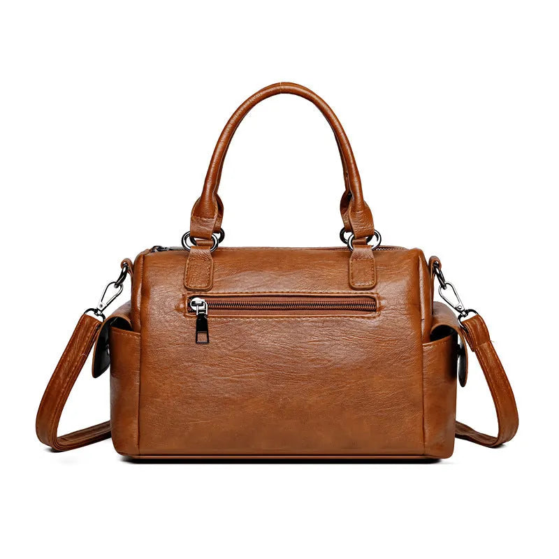 Vintage messenger bag in horizontal square shape with contrast stitching, available in multiple colours