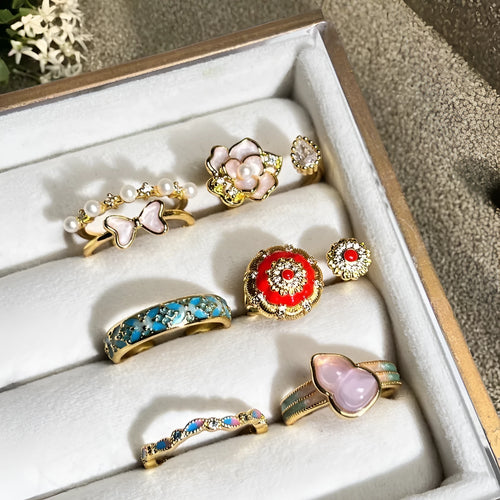Adjustable copper ring with vintage oil dripping gourd design, zircon inlay, and floral bow shapes in New Chinese style.