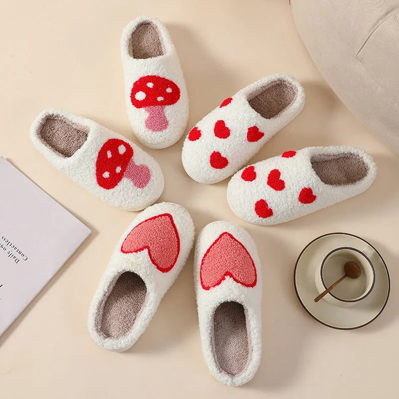 Women's plush slippers with cartoon love patterns and PVC non-slip soles in multiple colour options
