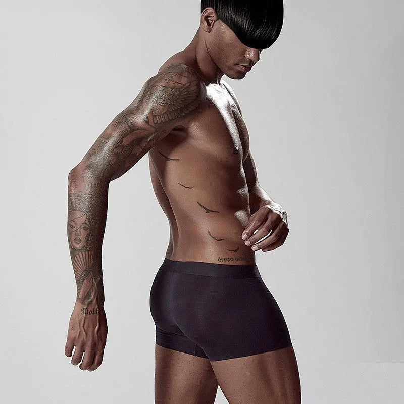 Seamless modal men's underwear in solid colours with mid-waist design for hip lifting and body shaping
