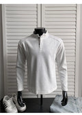 Men's grey asymmetrical stand-up collar cotton polo shirt with patchwork shoulder detail.