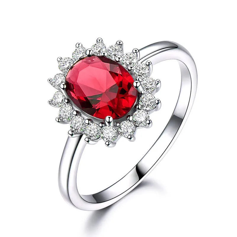 Copper flower-shaped women's ring with zirconium inlay, shown in green, blue, or red electroplated finish.