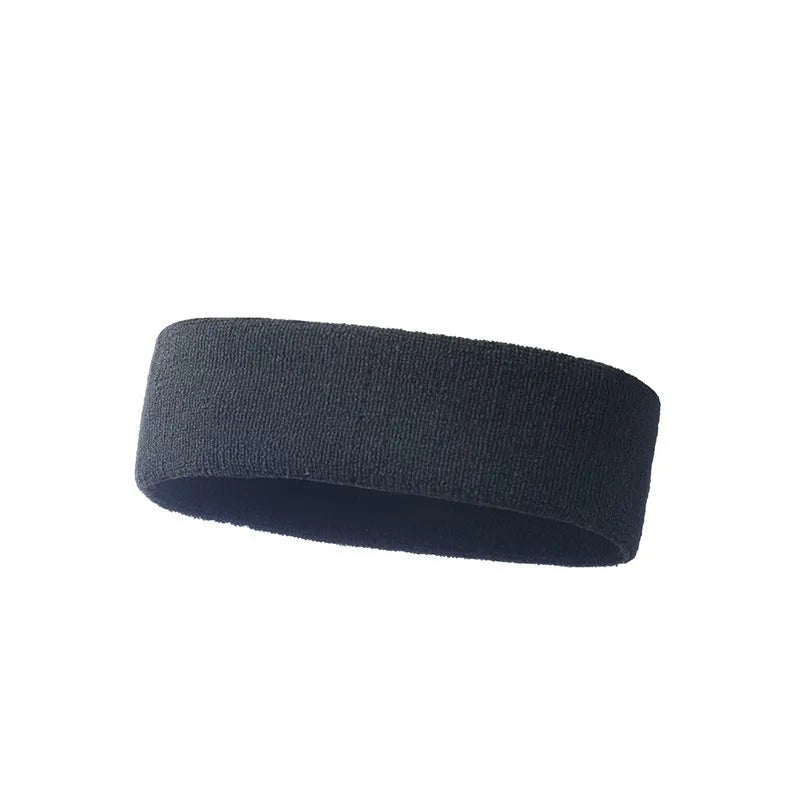 Elastic solid colour sports anti-sweat headband in blue on a white background.