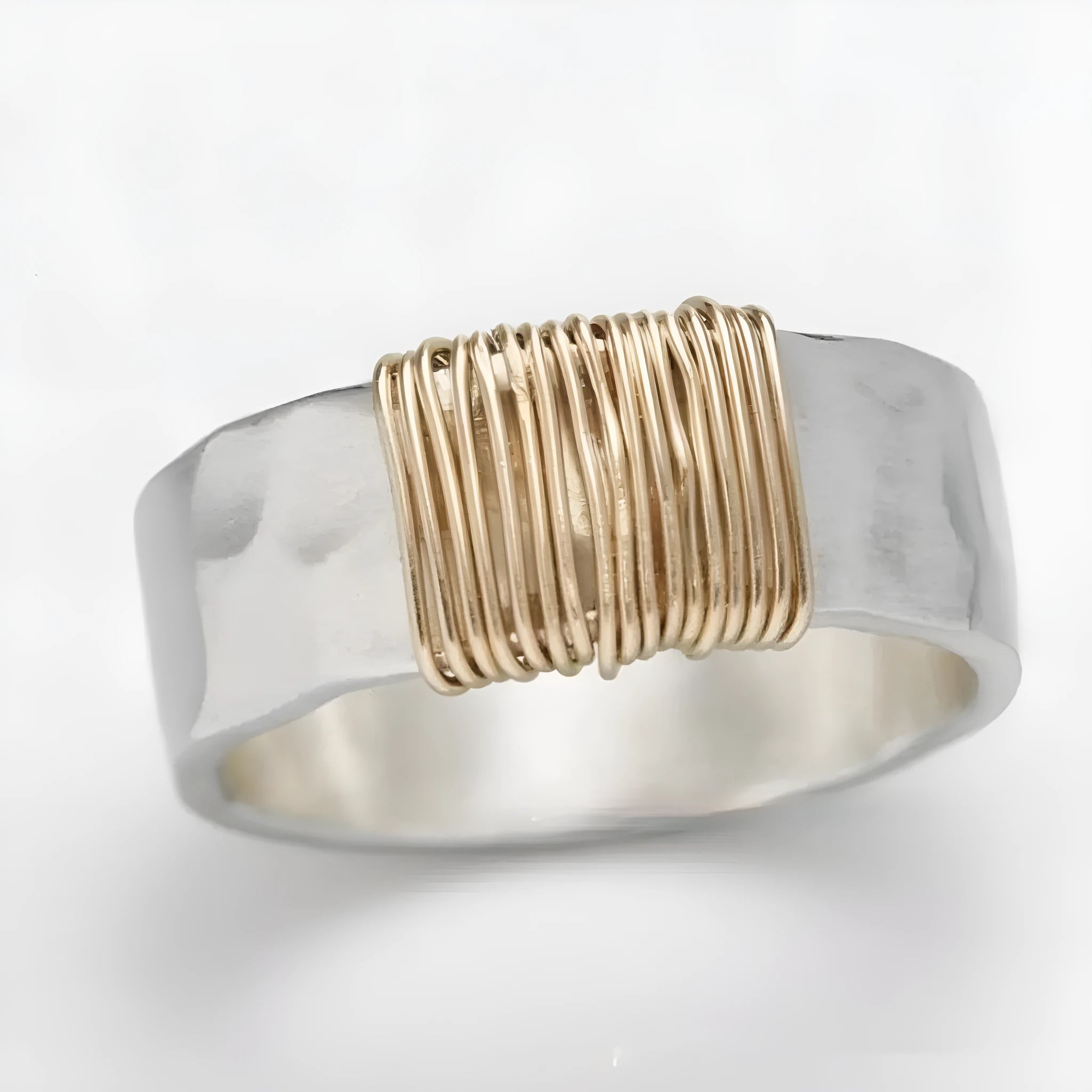 Copper geometric wide-face bracelet with irregular coil design in silver gold electroplated finish