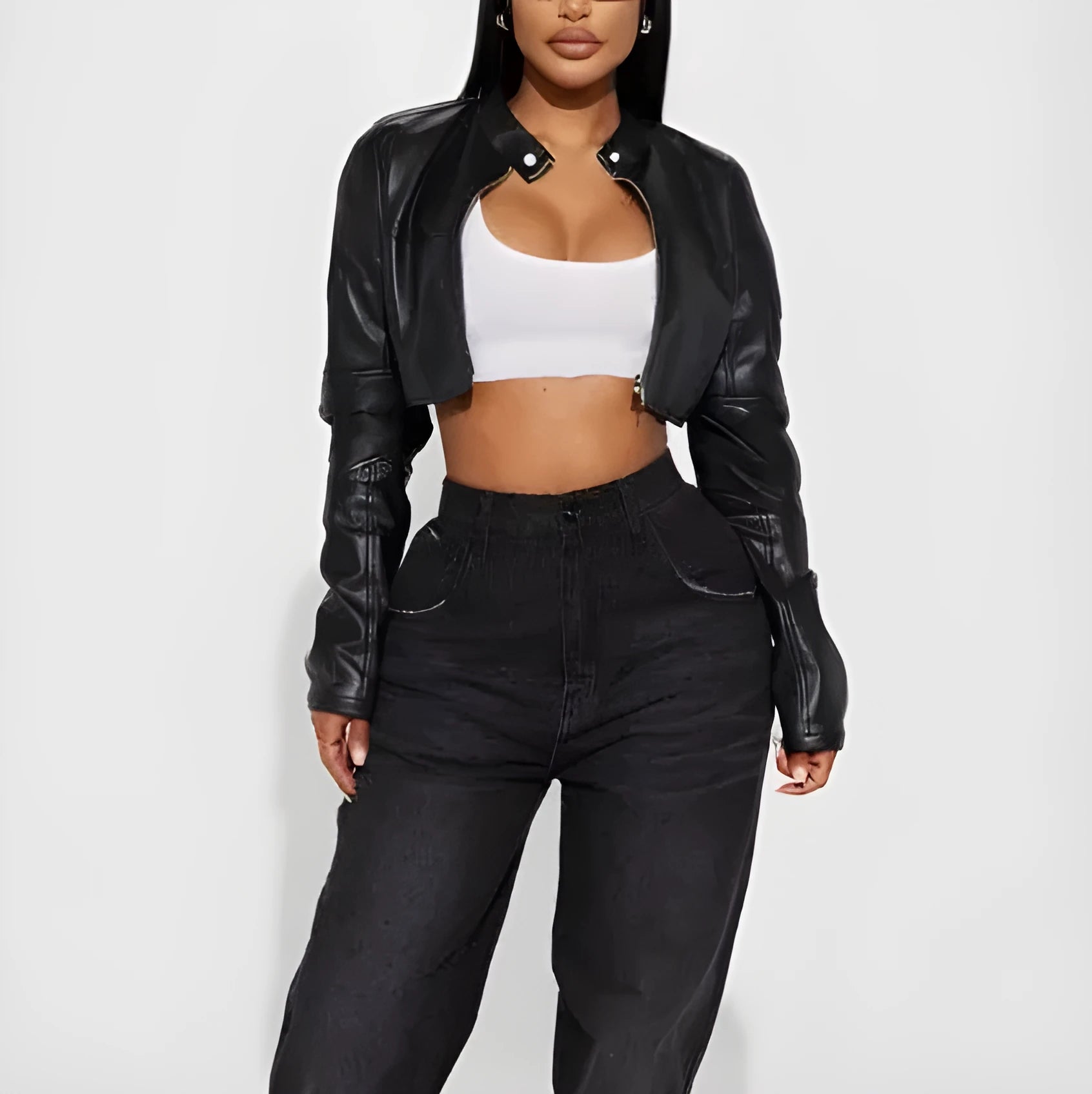 Women's cropped biker-style leather jacket in black with zipper details, slim fit, ultra-short length