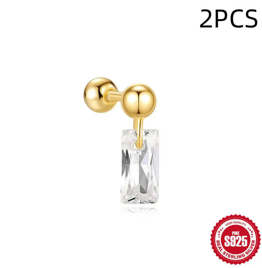 Close-up of S925 sterling silver square gravel flower stud earrings with a golden electroplated finish.