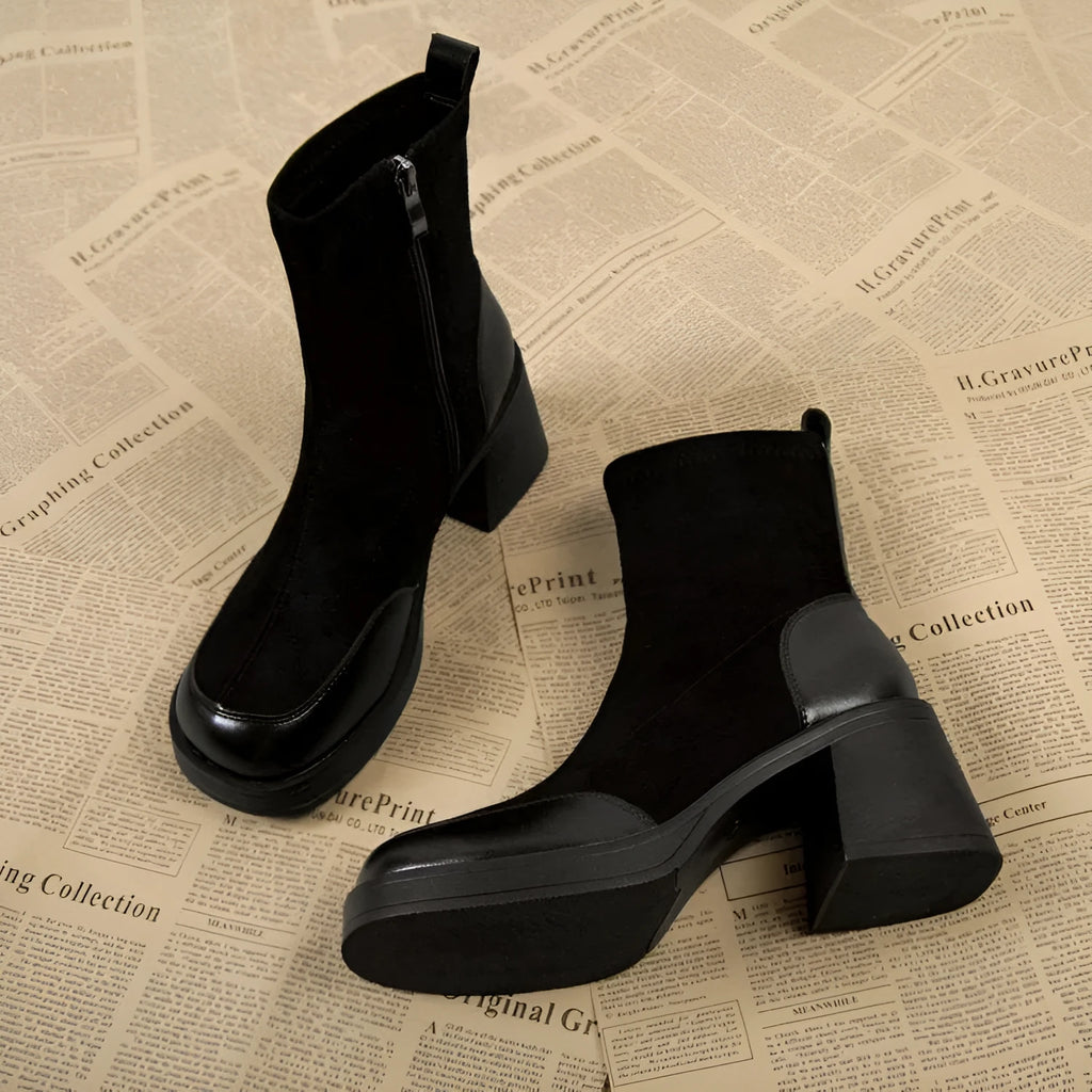 Black women's chunky heel martin boots with thick rubber sole and lace-up design