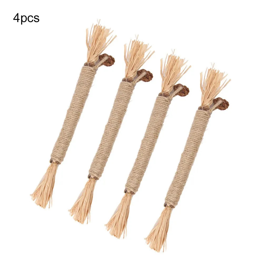 Three natural silvervine chew sticks for cats on a wooden surface, showing thick and fine diameter options