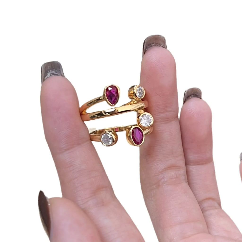Double-headed diamond ring with irregular cross geometry in red and white two-tone colour