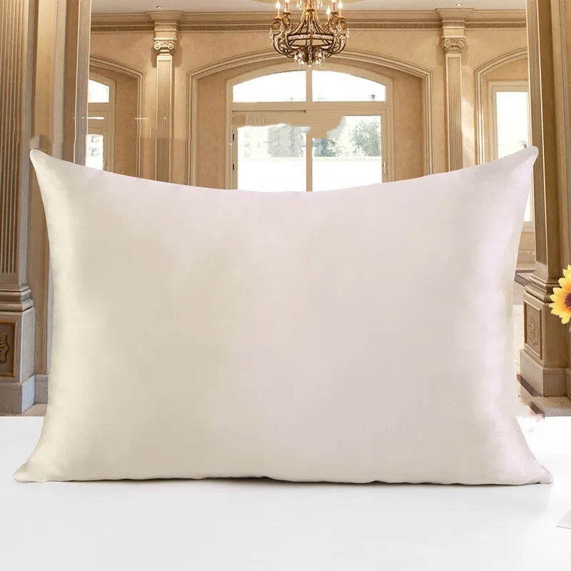 Double-sided silk pillowcase in apricot colour showing smooth satin weave texture.