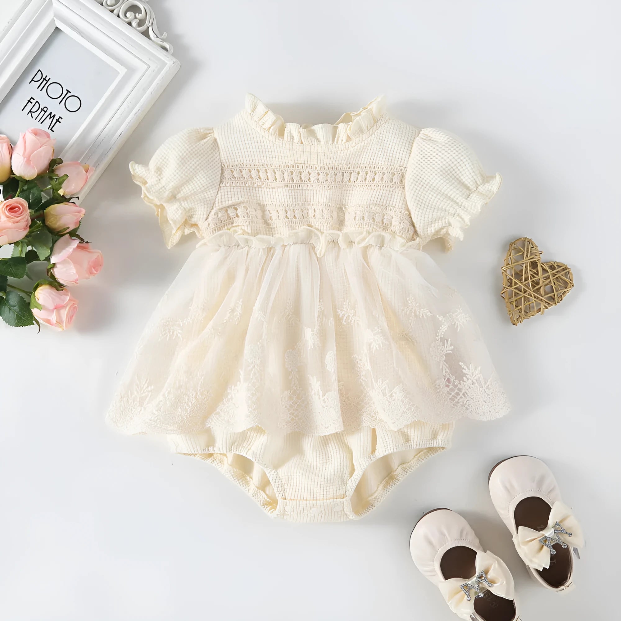 Cotton triangle jumpsuit in apricot with short sleeves and single-breasted front