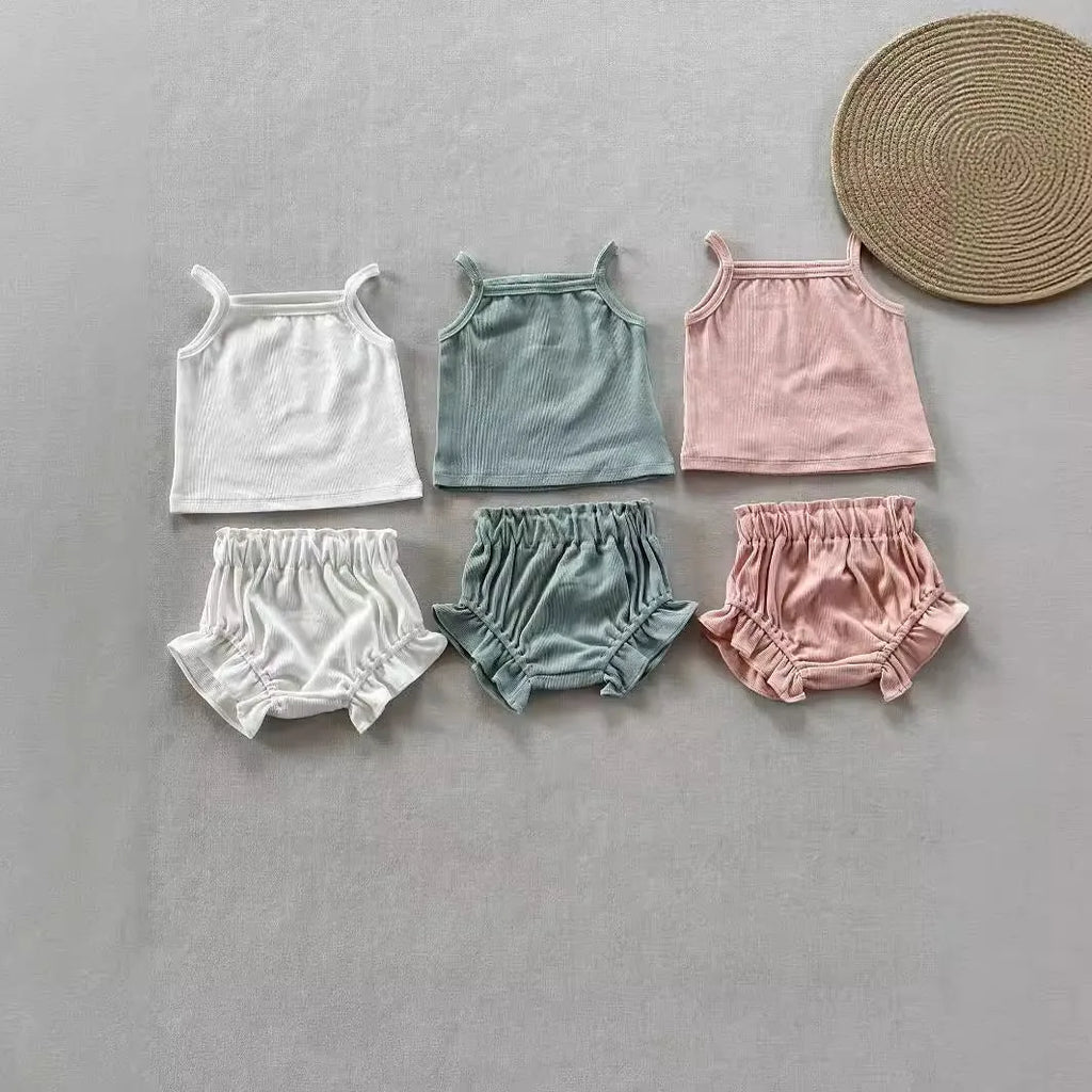 Women's cotton rib home wear two-piece set with sleeveless top and shorts in rose colour on white background