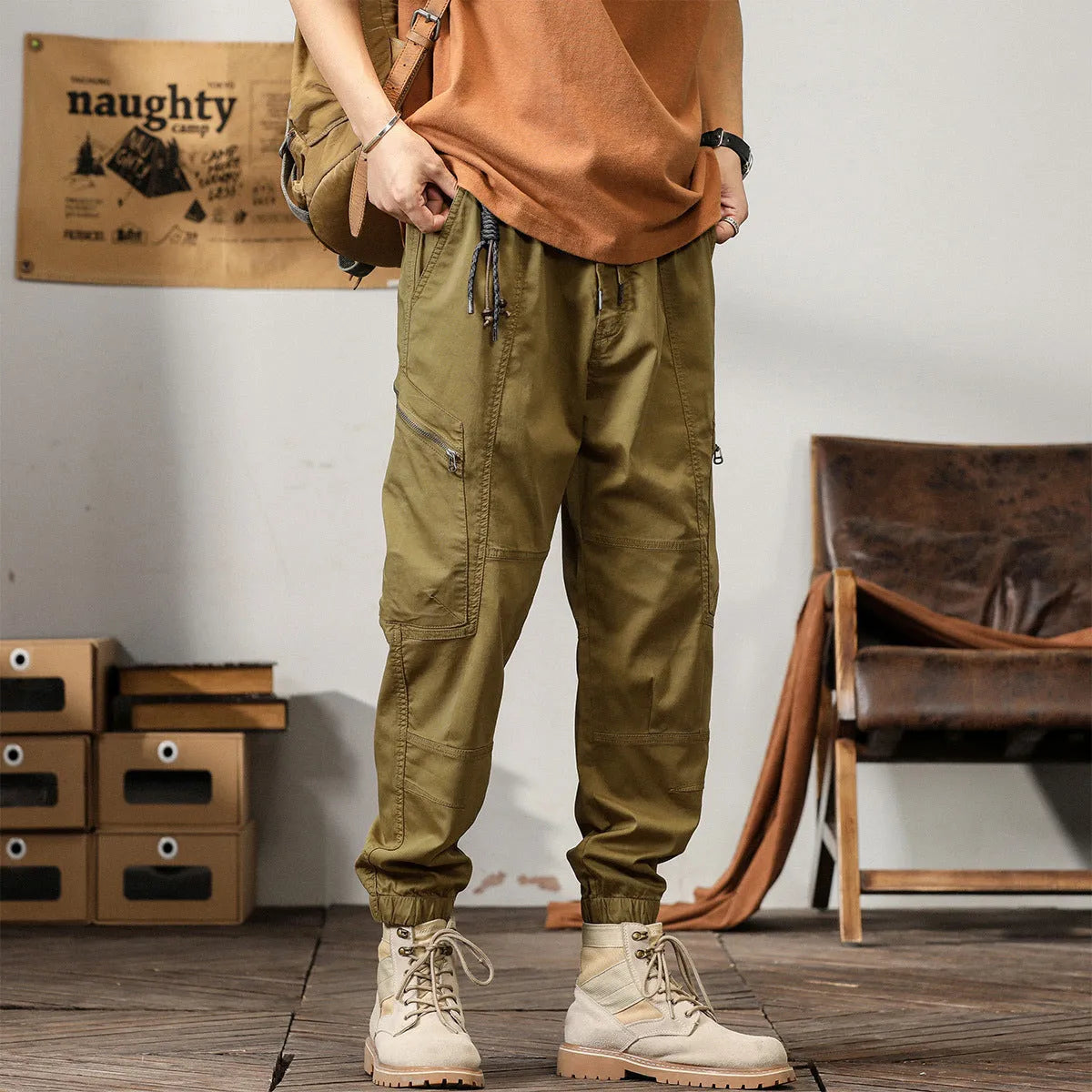 Men's Korean style tapered harem pants in cotton with small leg opening and mid-waist design