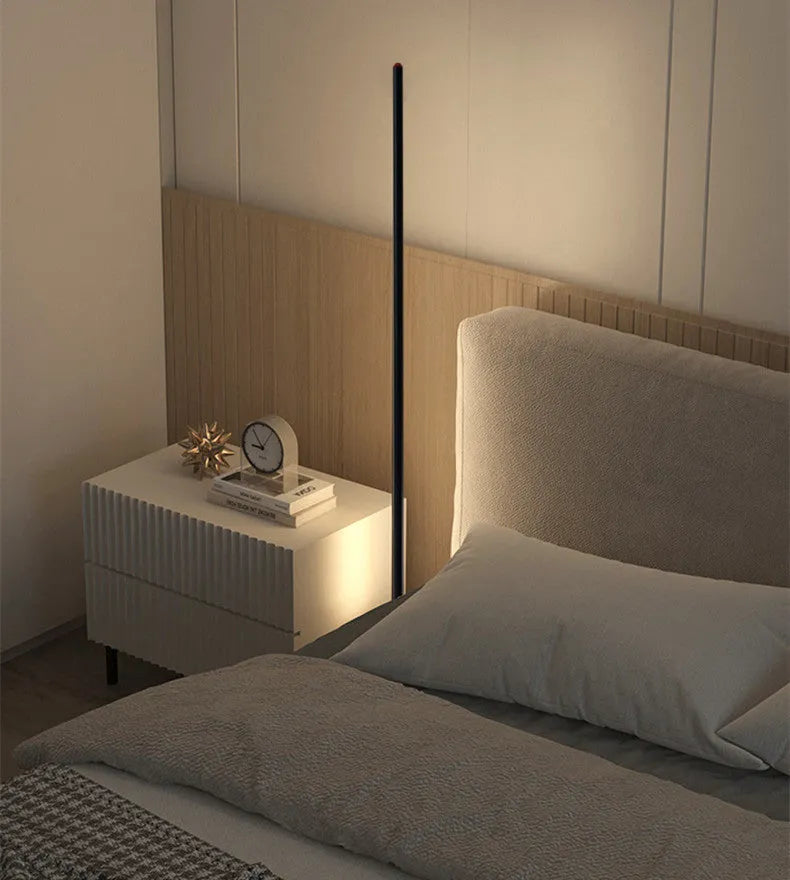 Simple vertical aluminium alloy floor lamp with LED light source on a modern stand.