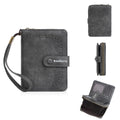 Women's black PU leather zipper coin purse with integrated card slots open.