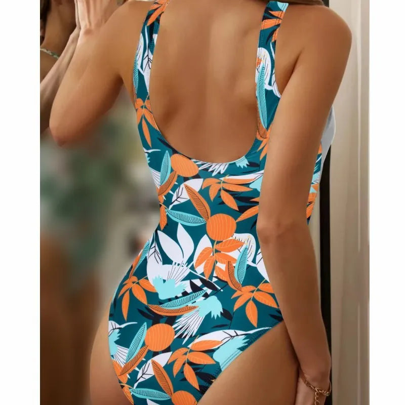 Women's high-waist one-piece swimsuit with an all-over printed pattern in a conservative style.