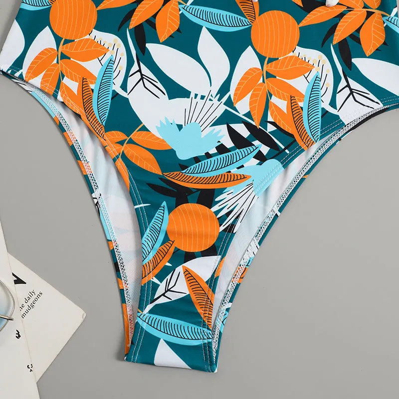 Women's high-waist one-piece swimsuit with an all-over printed pattern in a conservative style.