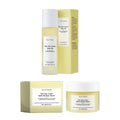Nourishing and Firming Body Care Kit showing skincare oil bottle and moisturising cream jar.