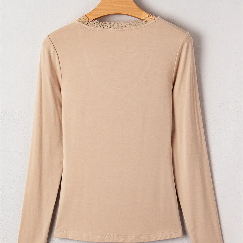 Women's red slim fit long sleeve casual pullover top on a hanger.