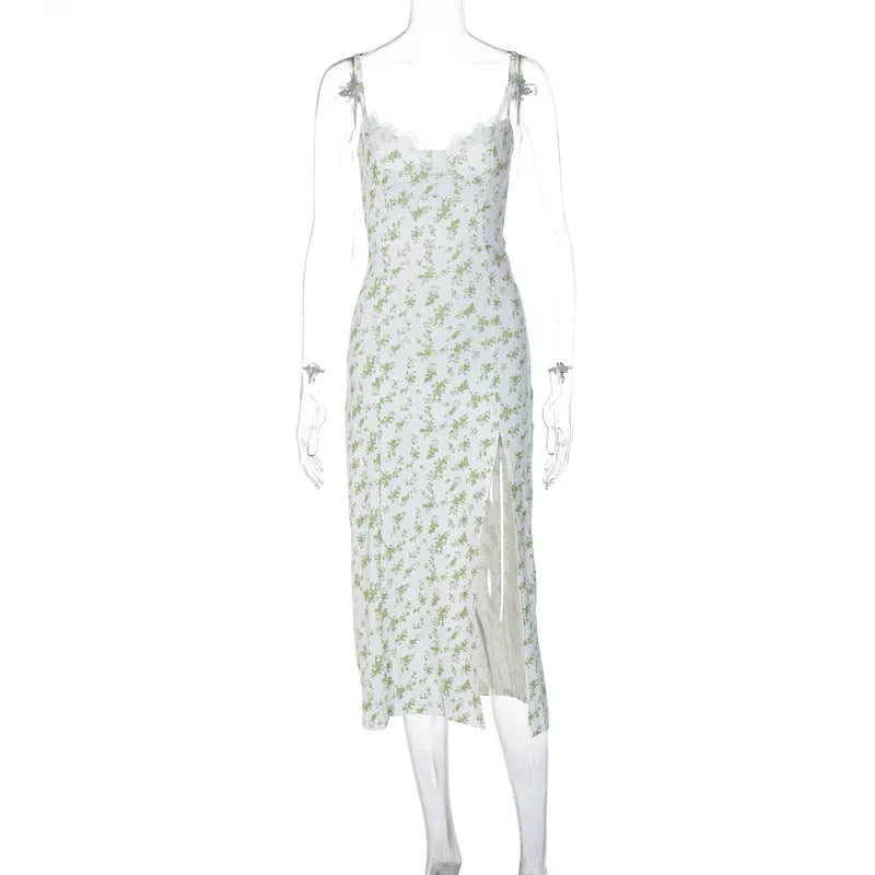 Blue lace flowers print long dress with side slit and suspender straps on a model