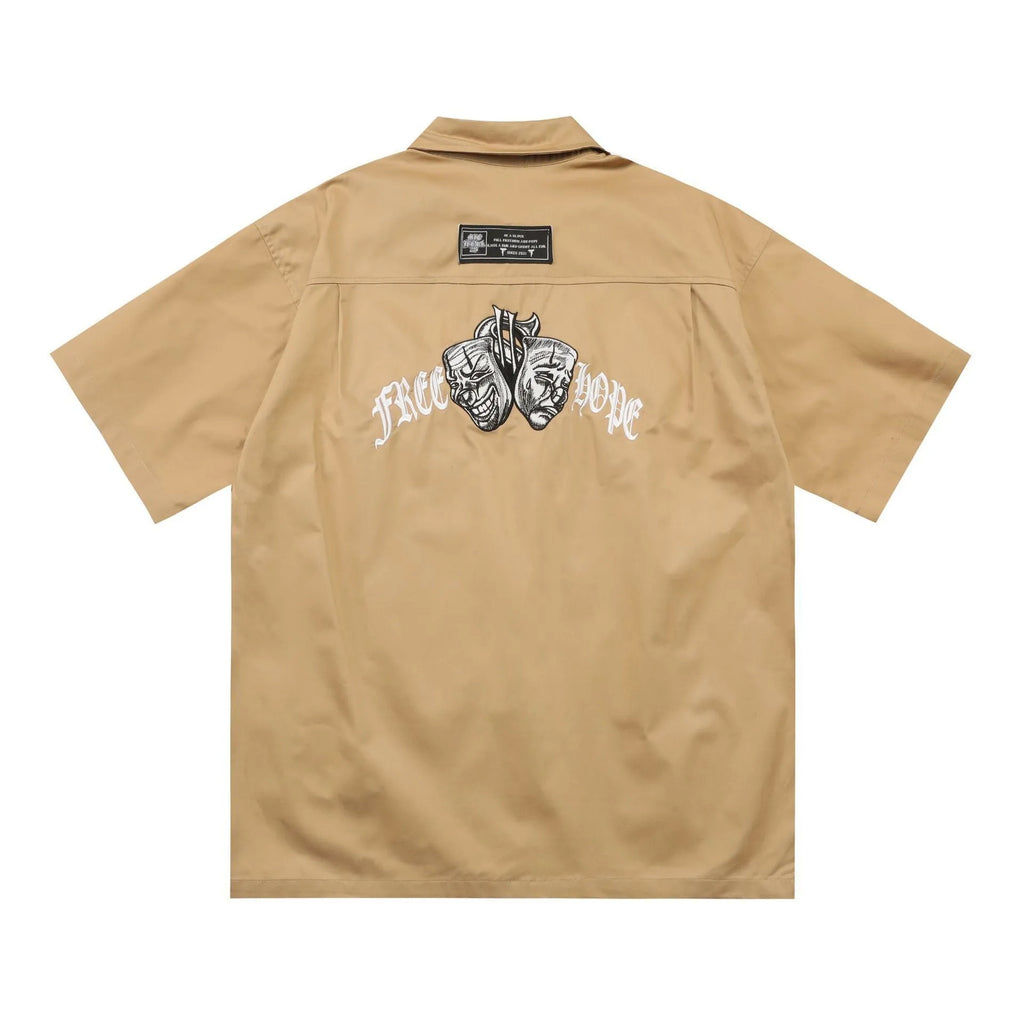 Men's cotton blend pocket work shirt in black or khaki with half sleeves and loose fit