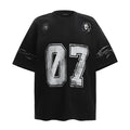 Men's black and white printed short-sleeved cotton t-shirt laid flat, showing sizes S, M, L, XL.