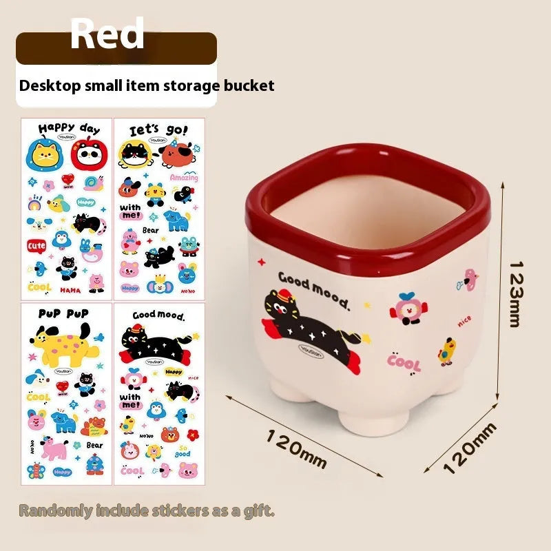 Cartoon-style red and brown plastic desktop storage organiser with 2L capacity and organisation stickers.