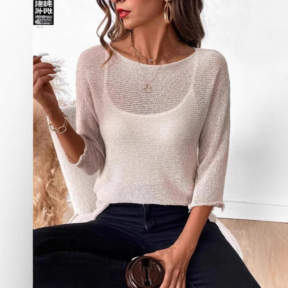 Women's thin knitted off-shoulder jumper in lavender purple with a 3D pattern and 3/4 sleeves.