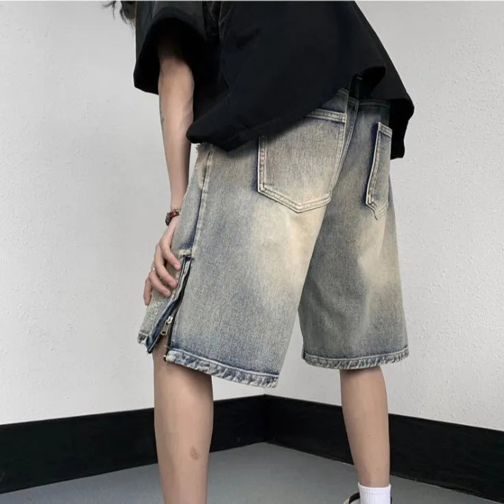 Blue retro denim shorts with wide-leg loose cut and tattered detailing, fifth pants length