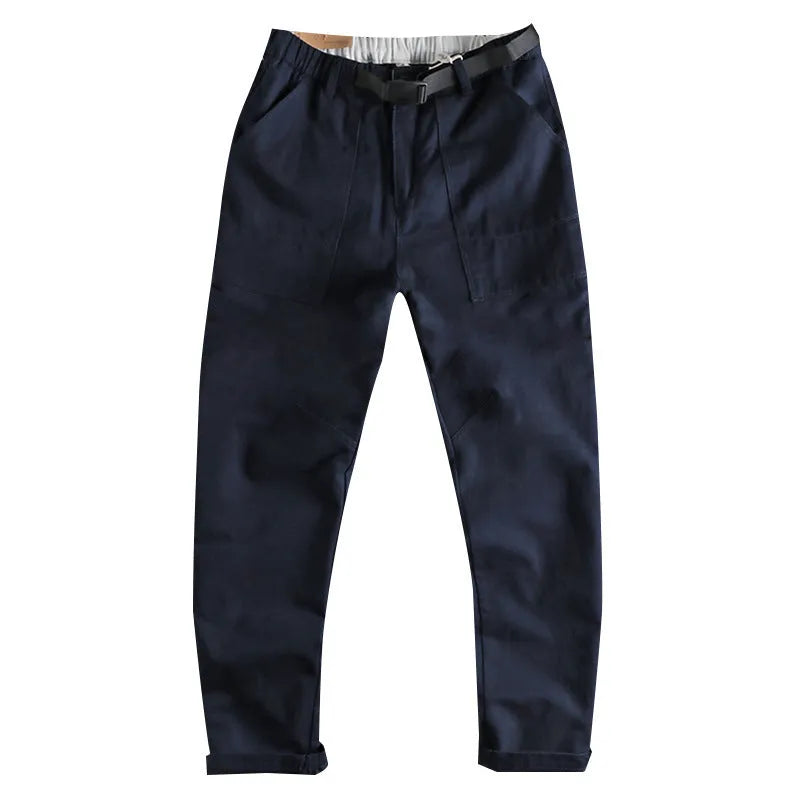 Men's khaki cotton work trousers with an adjustable N-I buckle belt on the waistband, shown with a 3D cut design.